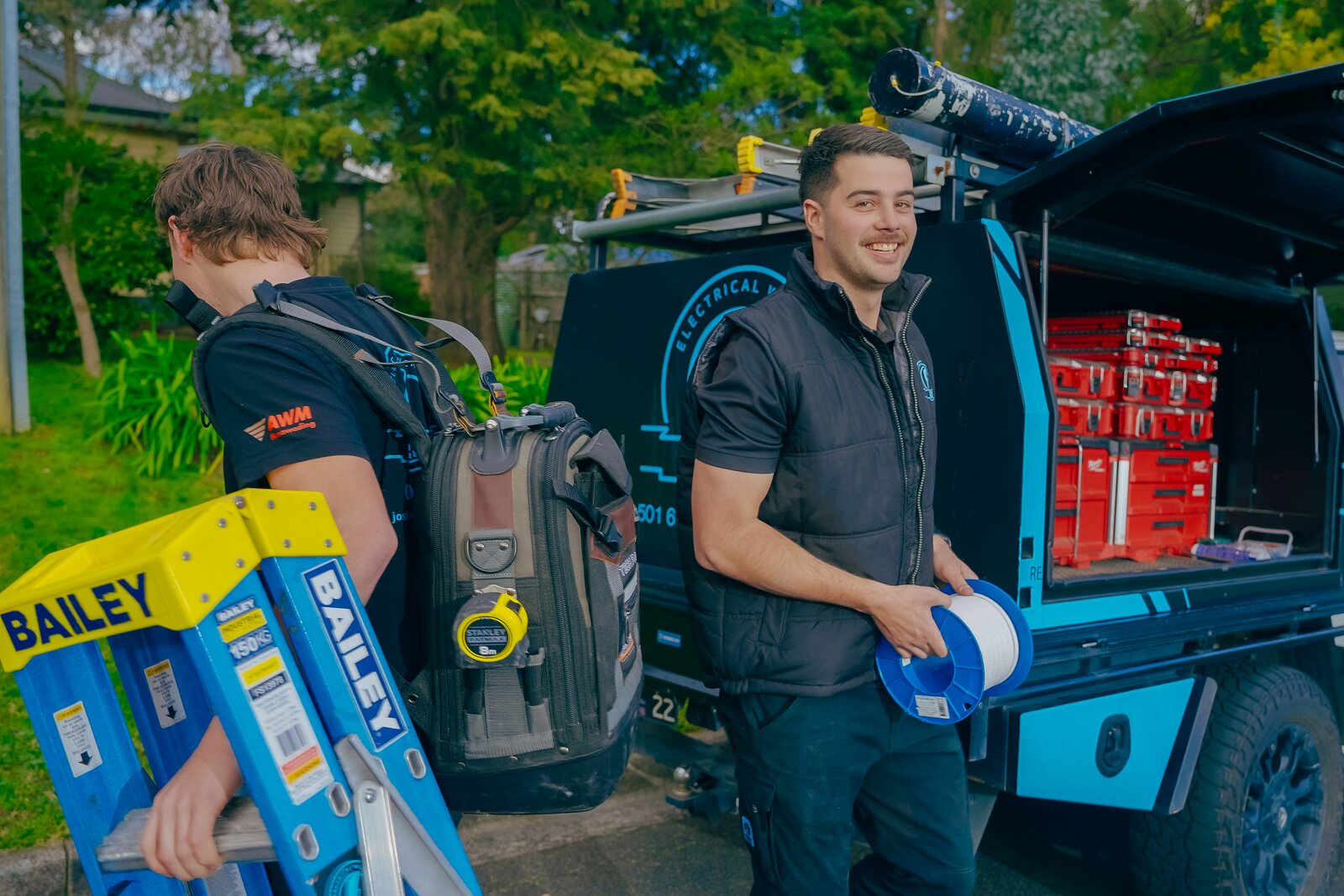 Josh Povey and Lachy carrying tools to a job in Melbourne&rsquo;s east